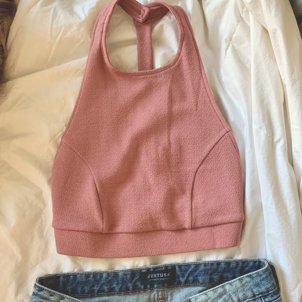 Open-backed, soft textured pink crop tank